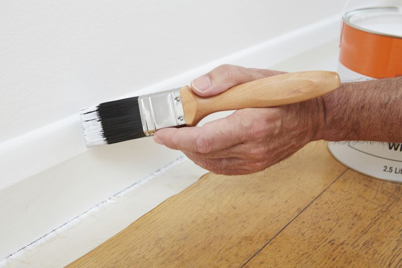 Applying Paint to Baseboards